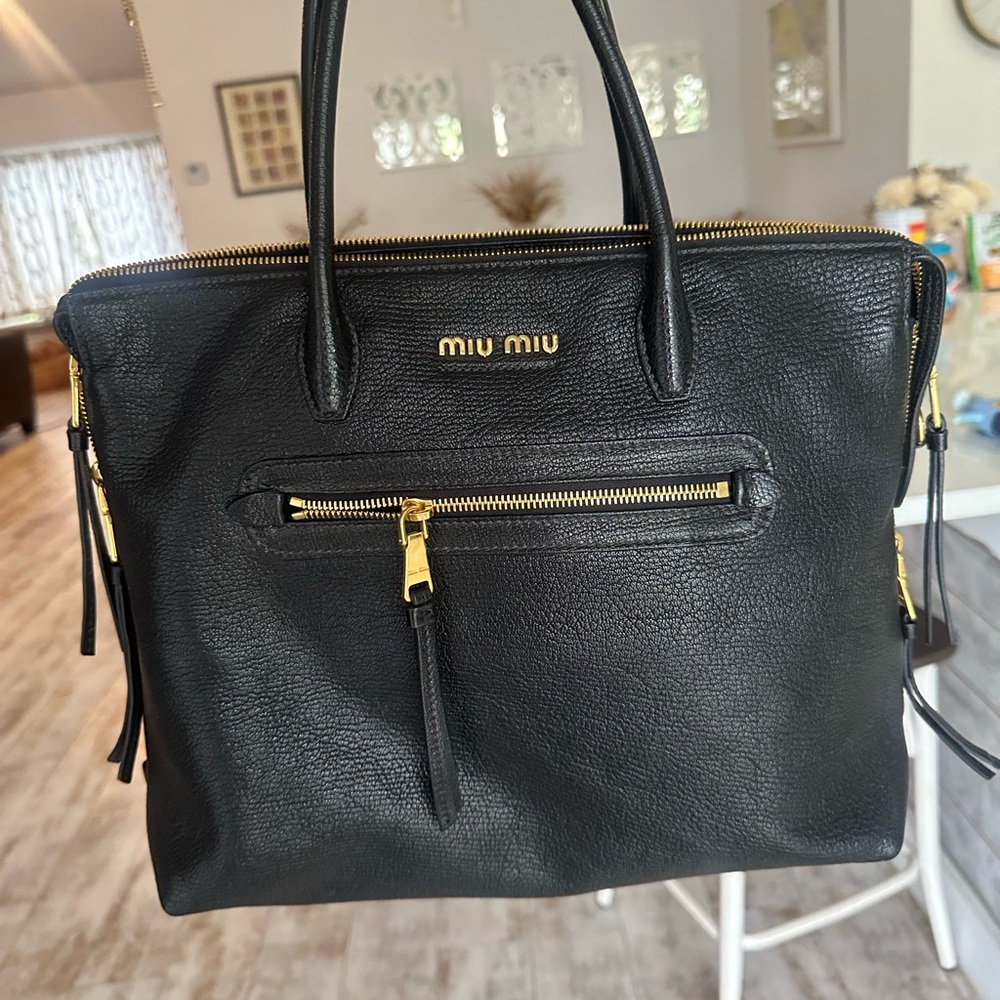 Miu Miu Black Leather Handbag with Gold Accents